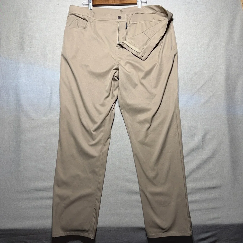TravisMathew Pants Men 42x32 Khaki Straight Open to Air Golf Performance Chinos